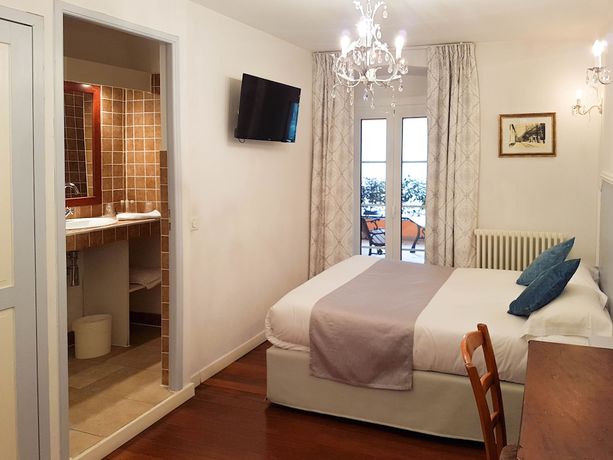 Imagen de la habitación del Hotel U Castellu. Foto 11
