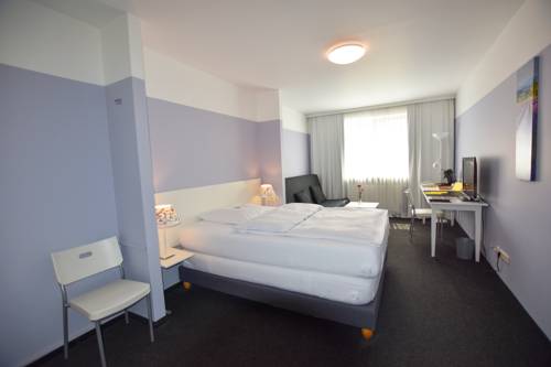 Imagen de la habitación del Hotel U. Foto 11