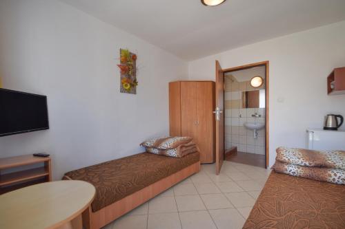 Imagen de la habitación del Hotel U Gosi. Foto 17