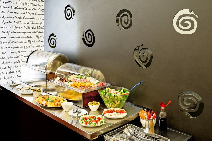Imagen del bar/restaurante del Hotel U Hada. Foto 11