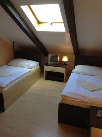 Imagen de la habitación del Hotel U Heligonky. Foto 11