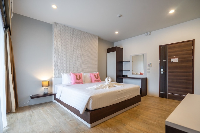 Imagen de la habitación del Hotel U Home. Foto 10