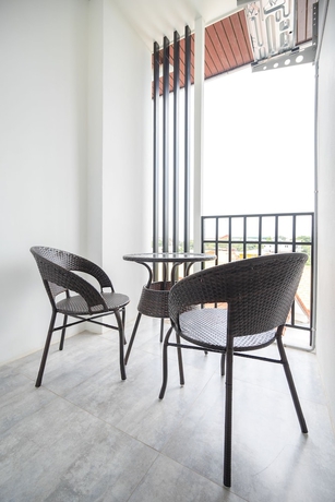 Imagen de la habitación del Hotel U Home. Foto 12