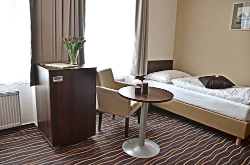 Imagen de la habitación del Hotel U Hradu. Foto 4