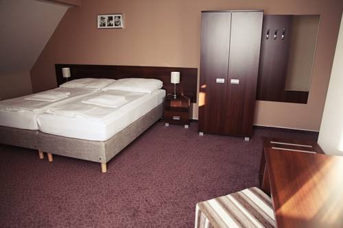 Imagen de la habitación del Hotel U Hradu. Foto 11