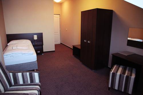 Imagen de la habitación del Hotel U Hradu. Foto 13