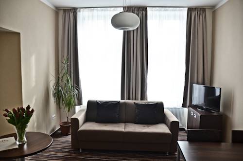 Imagen de la habitación del Hotel U Hradu. Foto 14