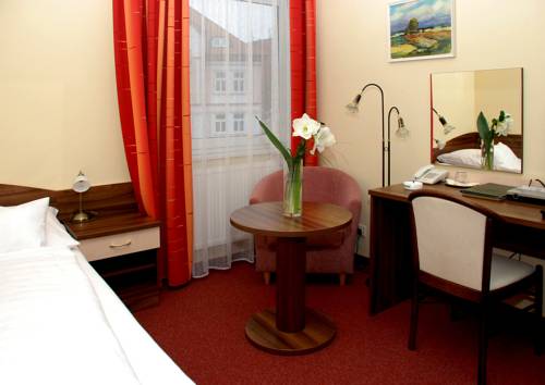 Imagen de la habitación del Hotel U Kaplicky. Foto 12