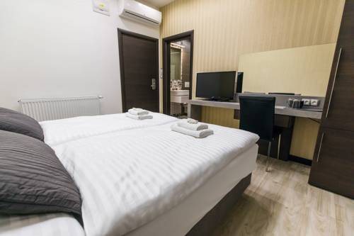 Imagen de la habitación del Hotel U Kostela. Foto 16