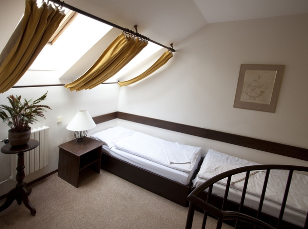 Imagen de la habitación del Hotel U Krize. Foto 11