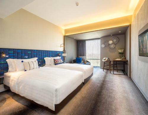 Imagen de la habitación del Hotel U Nimman Chiang Mai. Foto 4