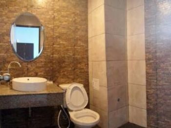 Imagen de la habitación del Hotel U Sabuy Mansion Trang. Foto 3