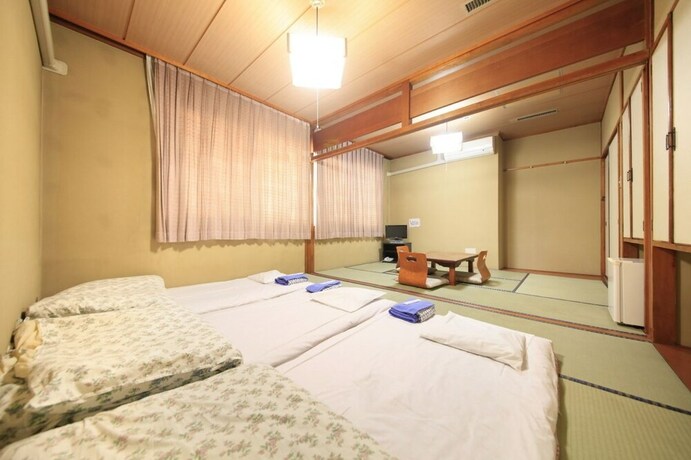 Imagen de la habitación del Hotel U Topia. Foto 23