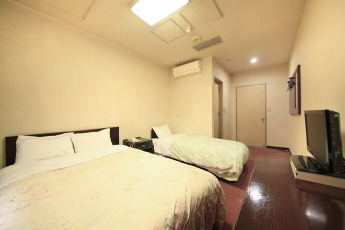 Imagen de la habitación del Hotel U Topia. Foto 26