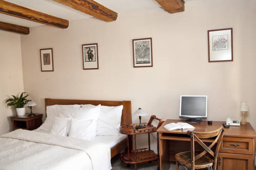 Imagen de la habitación del Hotel U Zlatého Lva. Foto 3