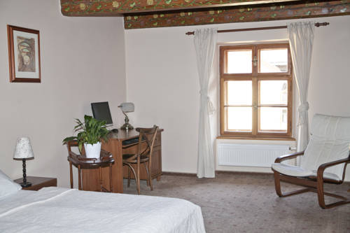 Imagen de la habitación del Hotel U Zlatého Lva. Foto 8