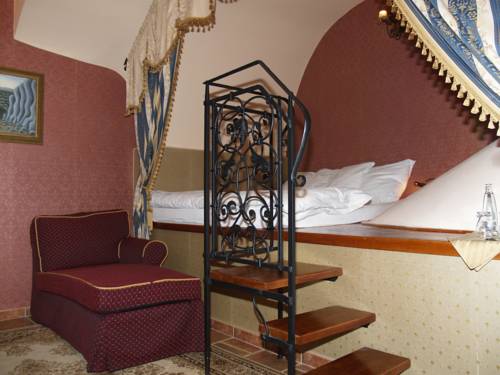 Imagen de la habitación del Hotel U Zlatého Lva. Foto 12