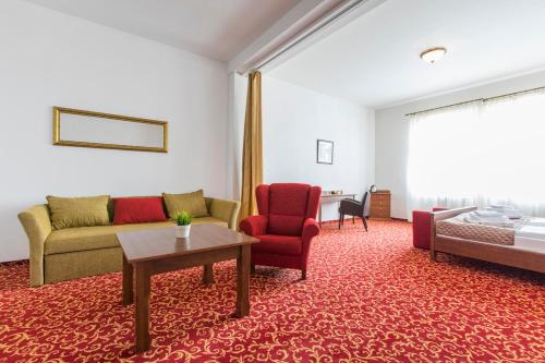 Imagen de la habitación del Hotel U Zlat&eacute;ho kohouta. Foto 7