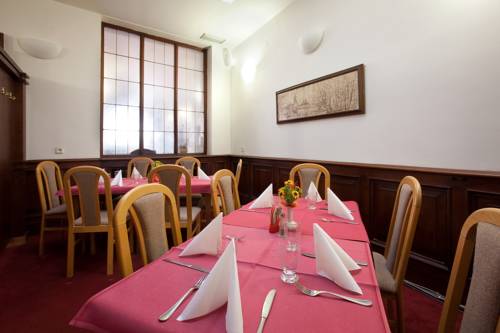 Imagen de la habitación del Hotel U Čern&eacute;ho Orla, Telč. Foto 2
