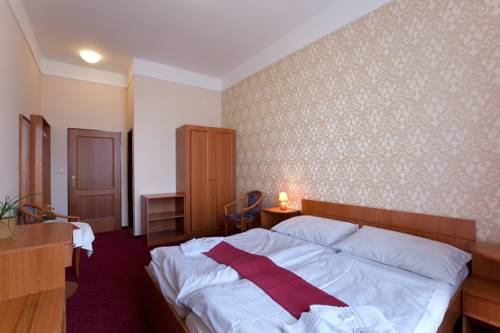 Imagen de la habitación del Hotel U Čern&eacute;ho Orla, Telč. Foto 6