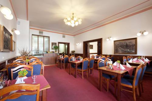 Imagen de la habitación del Hotel U Čern&eacute;ho Orla, Telč. Foto 8