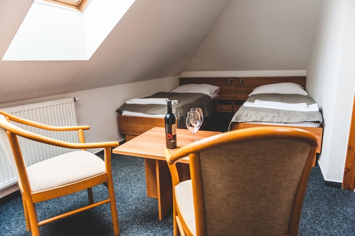 Imagen de la habitación del Hotel U Česk&eacute; koruny. Foto 9