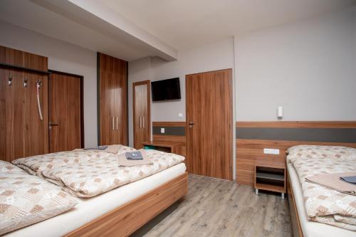 Imagen de la habitación del Hotel U koně. Foto 6