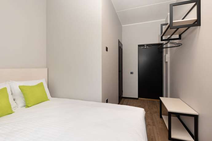 Imagen de la habitación del Hotel U11. Foto 6