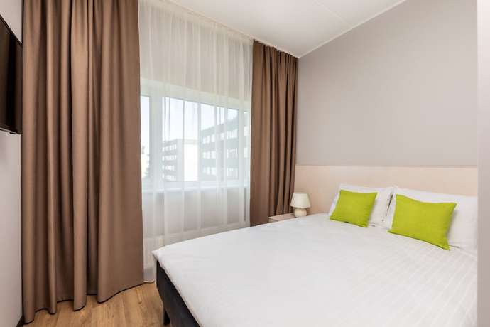 Imagen de la habitación del Hotel U11. Foto 8