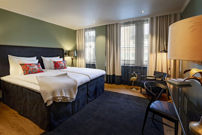 Imagen de la habitación del Hotel U14 Autograph Collection. Foto 11