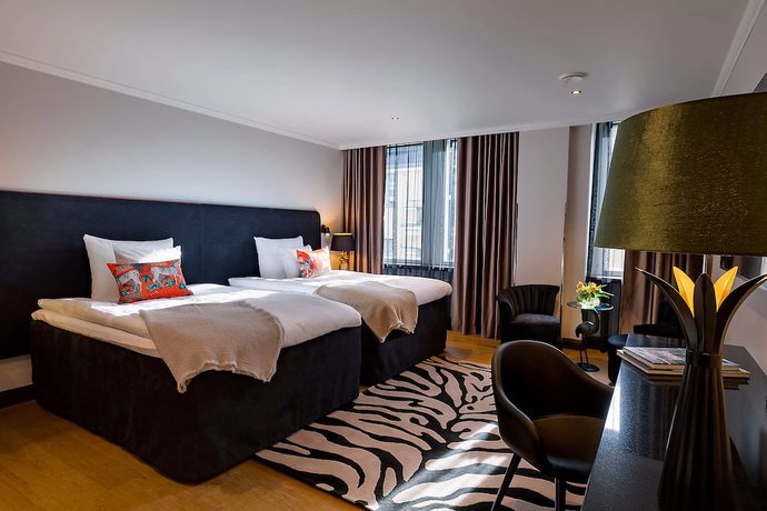 Imagen de la habitación del Hotel U14 Autograph Collection. Foto 16