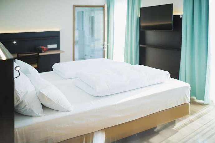 Imagen de la habitación del Hotel U7. Foto 9
