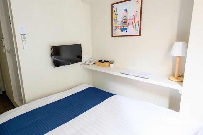 Imagen de la habitación del Hotel UENO WOO HOTEL. Foto 12