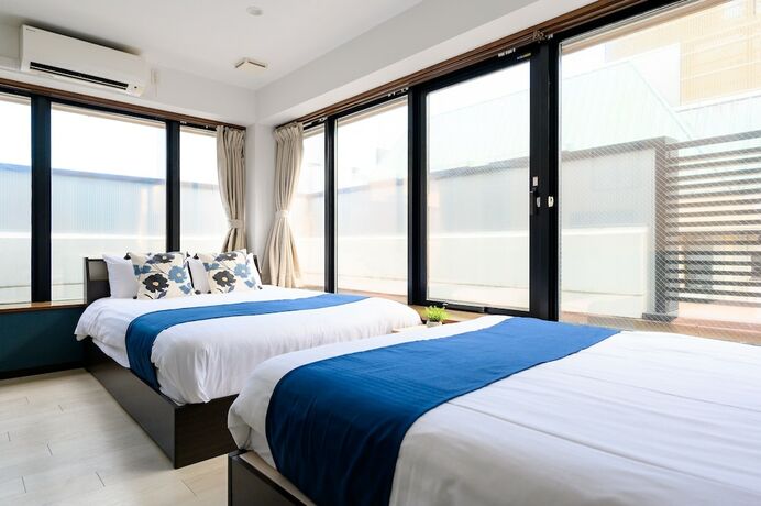 Imagen de la habitación del Hotel UENO WOO HOTEL. Foto 18
