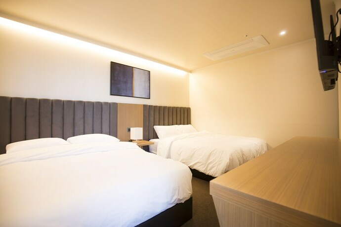 Imagen de la habitación del Hotel UH SUITE Haeundae Landscape 3rd Floor. Foto 5