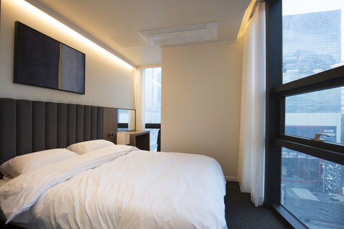Imagen de la habitación del Hotel UH SUITE Haeundae Landscape 3rd Floor. Foto 12