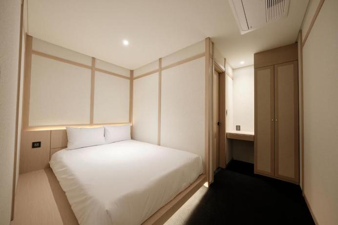 Imagen de la habitación del Hotel UH Suite Central Seoul. Foto 2