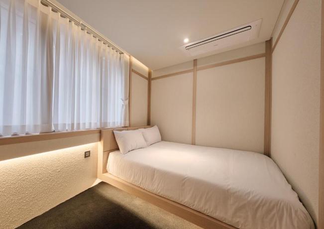 Imagen de la habitación del Hotel UH Suite Central Seoul. Foto 4
