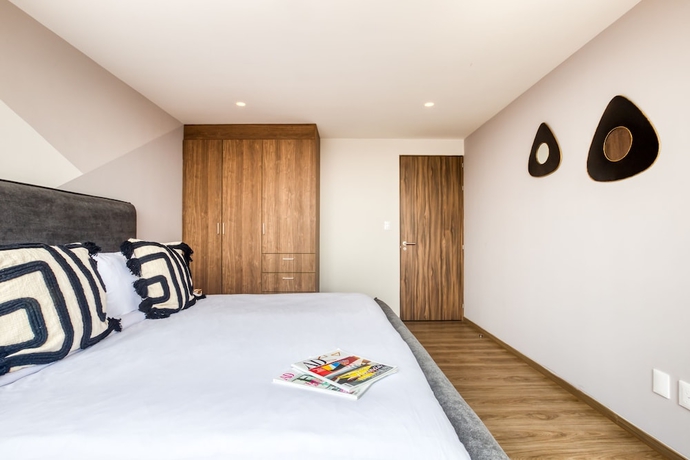 Imagen de la habitación del Hotel ULIV Luxe Apartments Polanco. Foto 6
