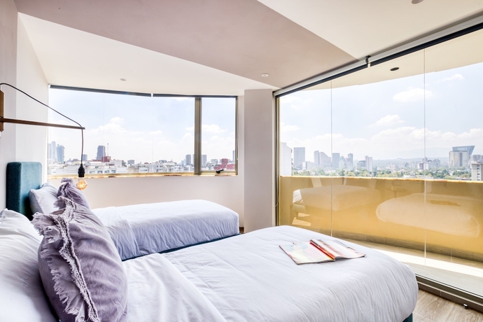 Imagen de la habitación del Hotel ULIV Luxe Apartments Polanco. Foto 7