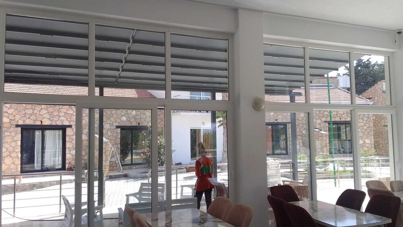 Imagen del bar/restaurante del Hotel UMBAY RESORT HOTEL. Foto 6