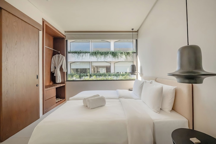 Imagen de la habitación del Hotel UMI Resort Uluwatu Bali. Foto 7