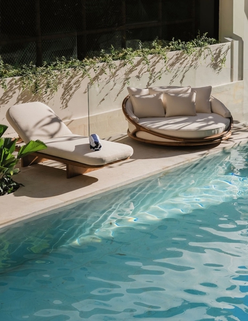Imagen de la piscina del Hotel UMI Resort Uluwatu Bali. Foto 14