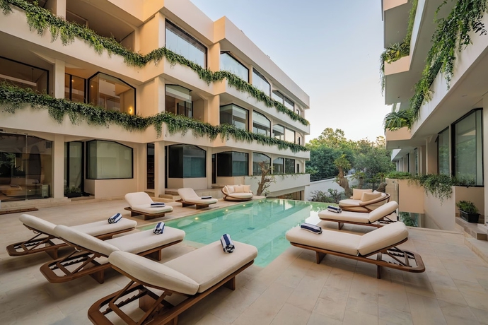 Imagen de la piscina del Hotel UMI Resort Uluwatu Bali. Foto 15