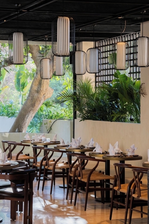 Imagen del bar/restaurante del Hotel UMI Resort Uluwatu Bali. Foto 4