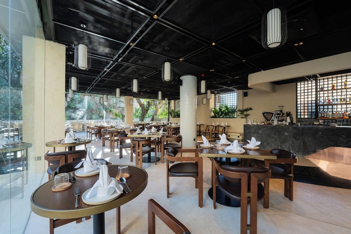 Imagen del bar/restaurante del Hotel UMI Resort Uluwatu Bali. Foto 5