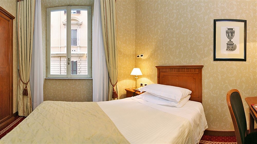 Imagen de la habitación del Hotel UNA Empire Roma. Foto 7