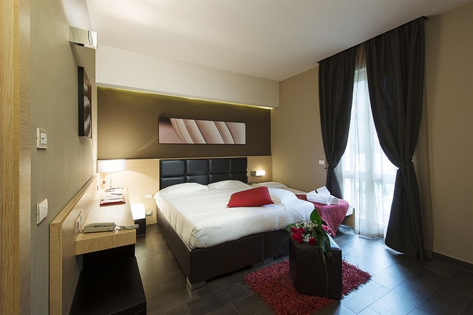 Imagen de la habitación del Hotel UNA Hotels Villa dei Platani. Foto 4