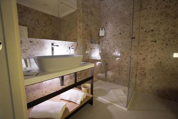 Imagen de la habitación del Hotel UNA La Martella Matera. Foto 4