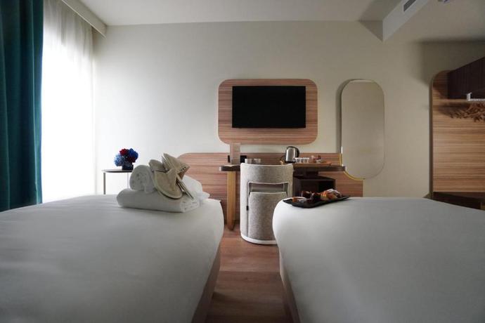 Imagen de la habitación del Hotel UNA La Martella Matera. Foto 6